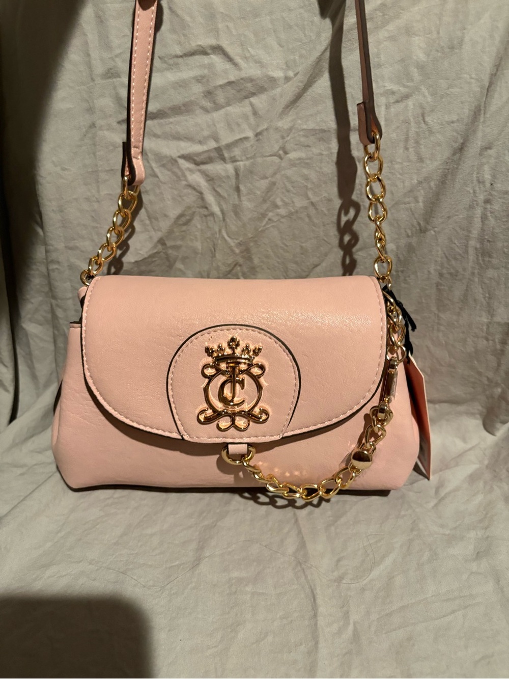 Juicy Couture Royal Crest Crossbody Bag in Clay Pink